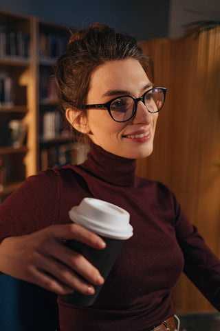 Close photo of a woman wearing a bordeaux turtleneck