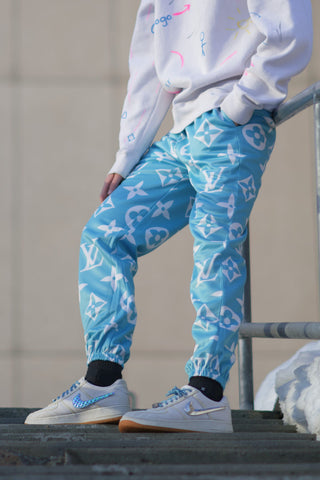 Close shot of light blue joggers