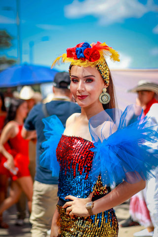 Woman in a colorful outfit and a floral headband