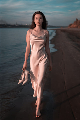 woman wearing satin slip-on dress