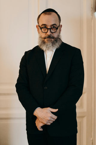 Jewish man wearing a black suit