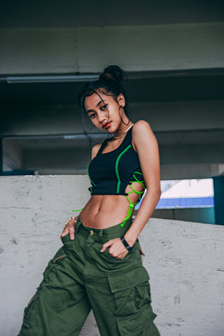 Girl posing with cargo pants and a cropped top