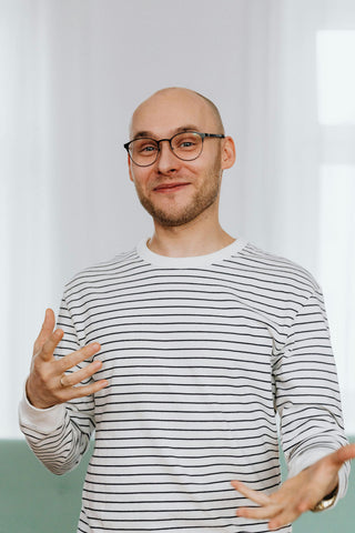 Happy Man wearing a tee with horizontal stripes