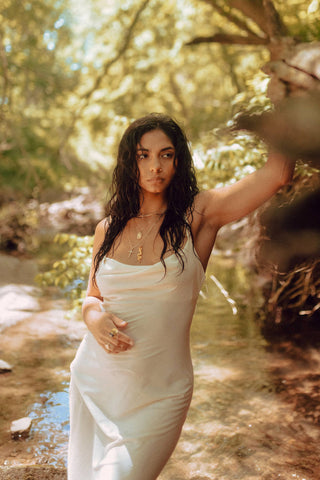 Woman posing with a slip dress