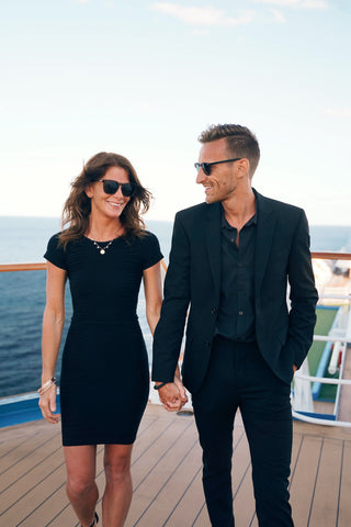 a couple in black outfits