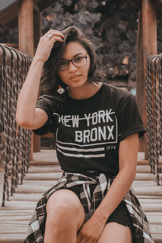 Photo of a girl wearing a graphic tee