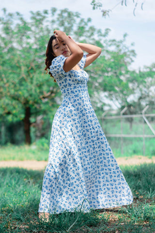 woman posing in a maxi dress