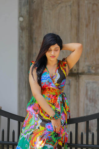 Woman posing with a colorful maxi dress