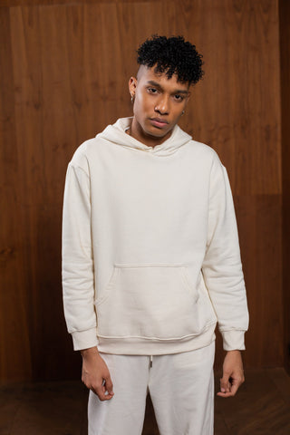 Man posing with a white tracksuit