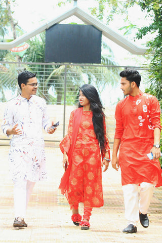 Indian people walking in typical chikankari kurti outfits