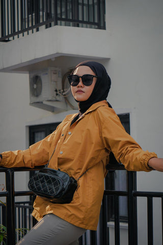 Hijab, pants and shades