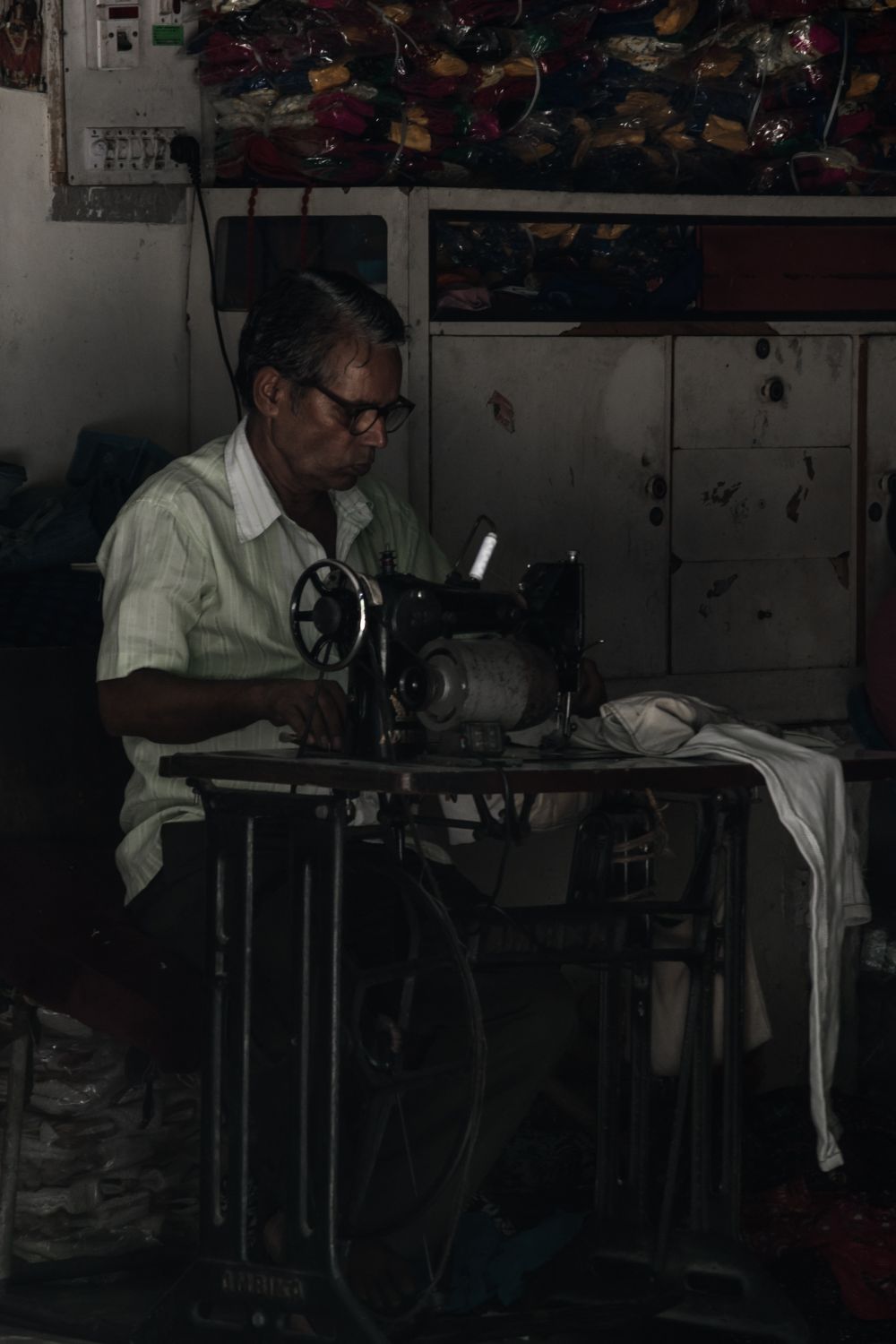 factory worker sewing