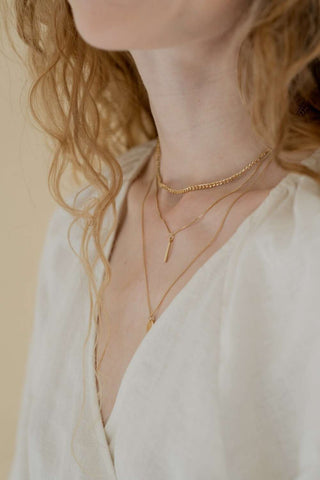 how to dress parisian necklace