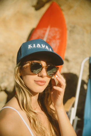 cute beach date outfit blue cap
