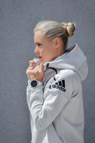 Profile picture of a blonde woman wearing a white sport jacket