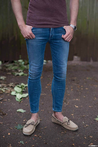 man wearing women jeans