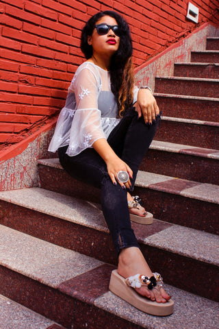 sheer blouse gray skirt