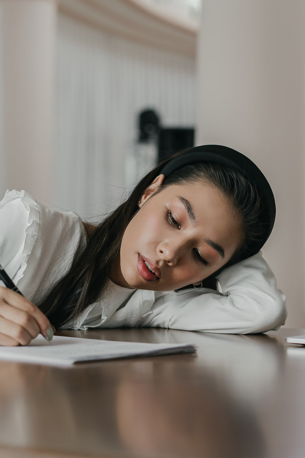 girl writing shopping list