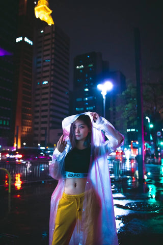 woman raincoat city