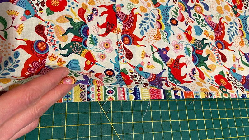 lay the main pillowcase fabric on top of the cuff