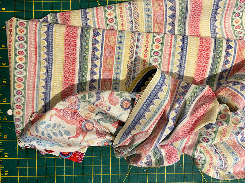start to pull the pillowcase fabric out of the cuff