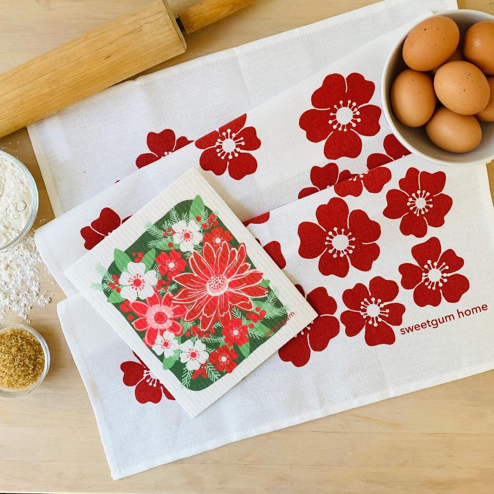 Image of Red Flowers Tea Towel + Poinsettia Swedish Dishcloth Bundle