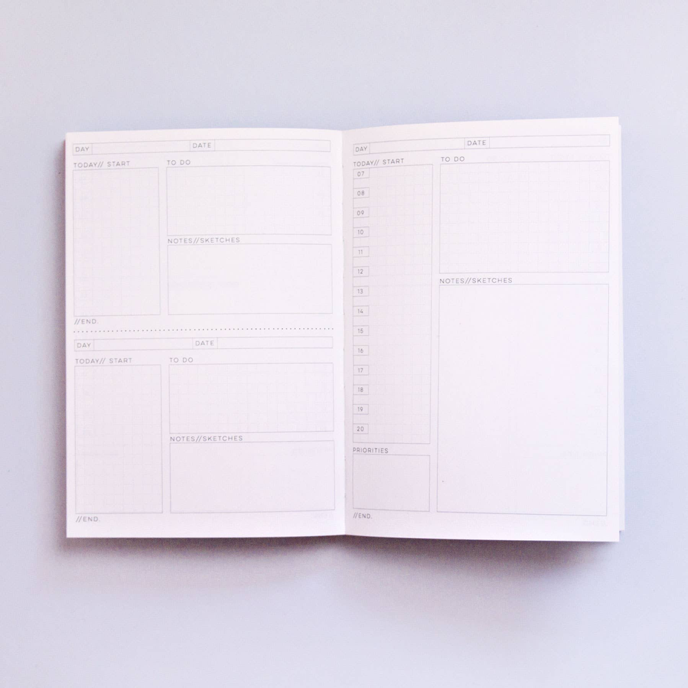 Daily Planner Book by The Completist Little Otsu