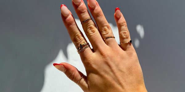 hand with stacking rings