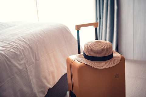 Suitcase in hotel room