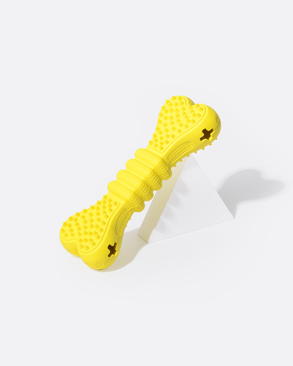 https://cdn.shopify.com/s/files/1/0006/6178/2586/products/TreatDispensingDogToy_YellowBone.jpg?v=1672284146