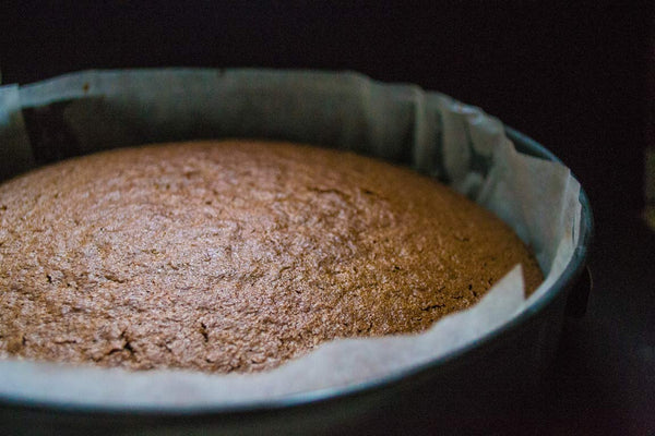 Cake made with Macadamia Honey being baked in a spring form pan. Hawaii Honey from Rainbow Bees is popular for baked goods