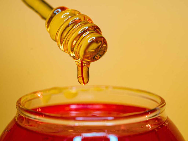 Jar of Rainbow Bees Lehua Honey. in Hawaii, Big Island Honey is a popular ingredient for cooking.