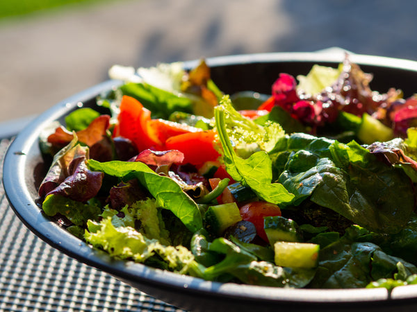 Salad with dressing made with raw honey. Hawaii style vinaigrette dressing.