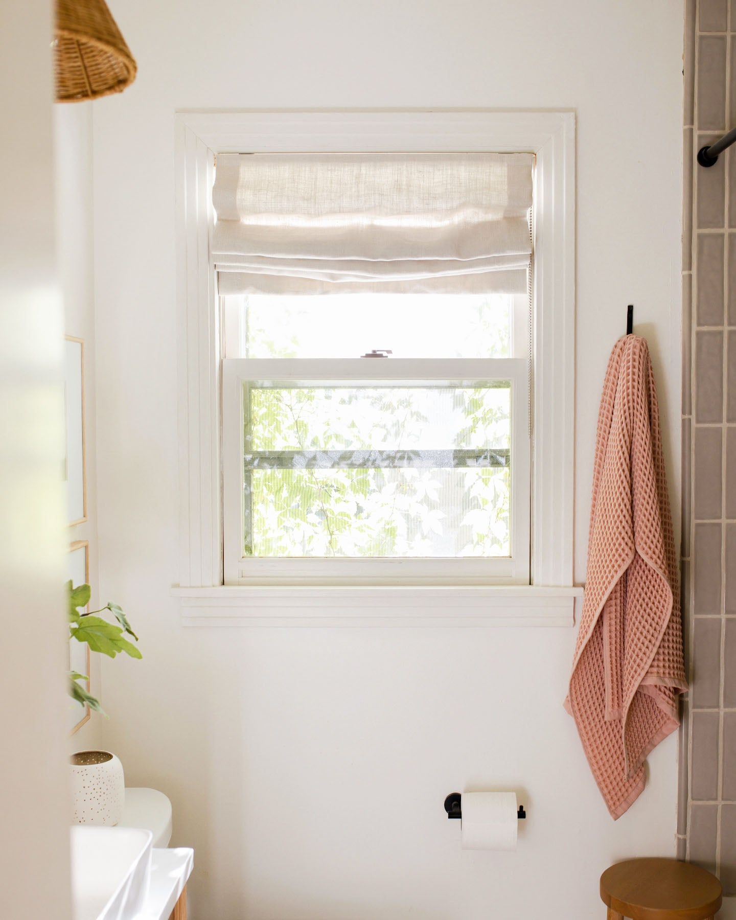 Checkout this bright bathroom makeover. Clare’s Whipped is the perfect white paint color to bring some warmth to the small space. 