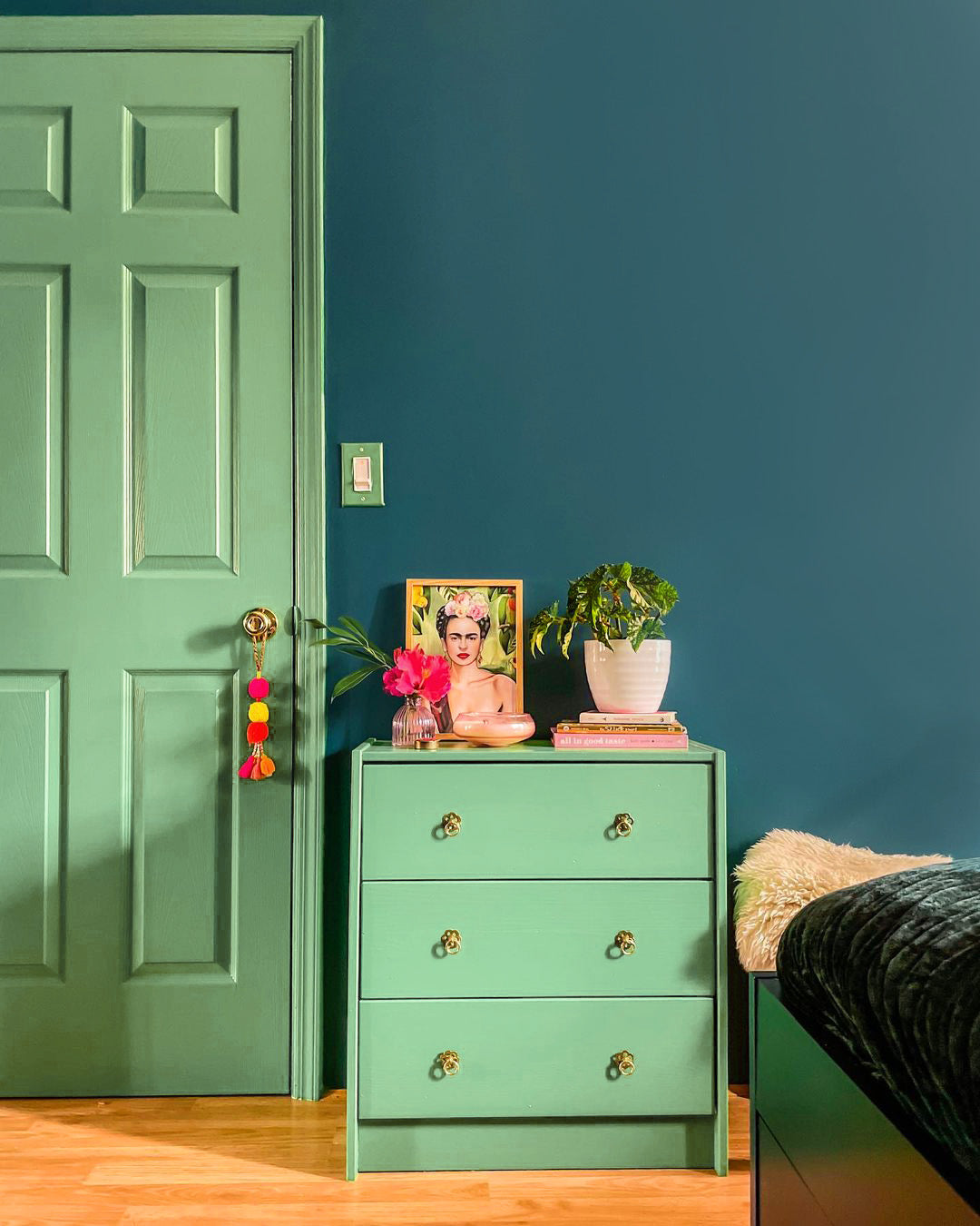 Creative paint ideas to inspire your next paint project. This dresser and trim are painted in Clare Matcha Latte with Walls painted in the blue paint color Deep Dive. 