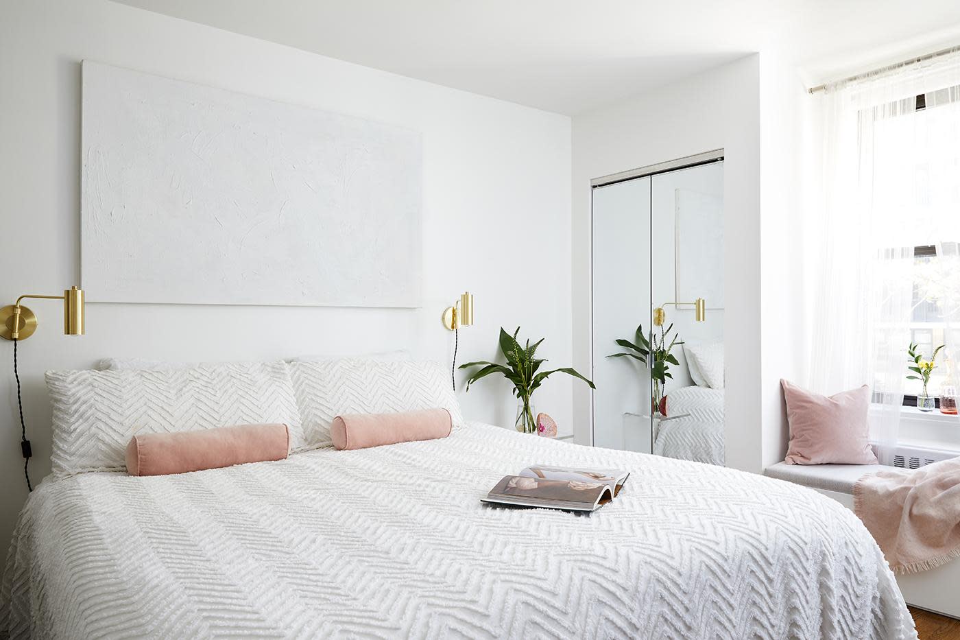 This stylish all-white bedroom makeover combines little luxuries and minimalist decor to create the ultimate bedroom retreat. See inside this dreamy space.