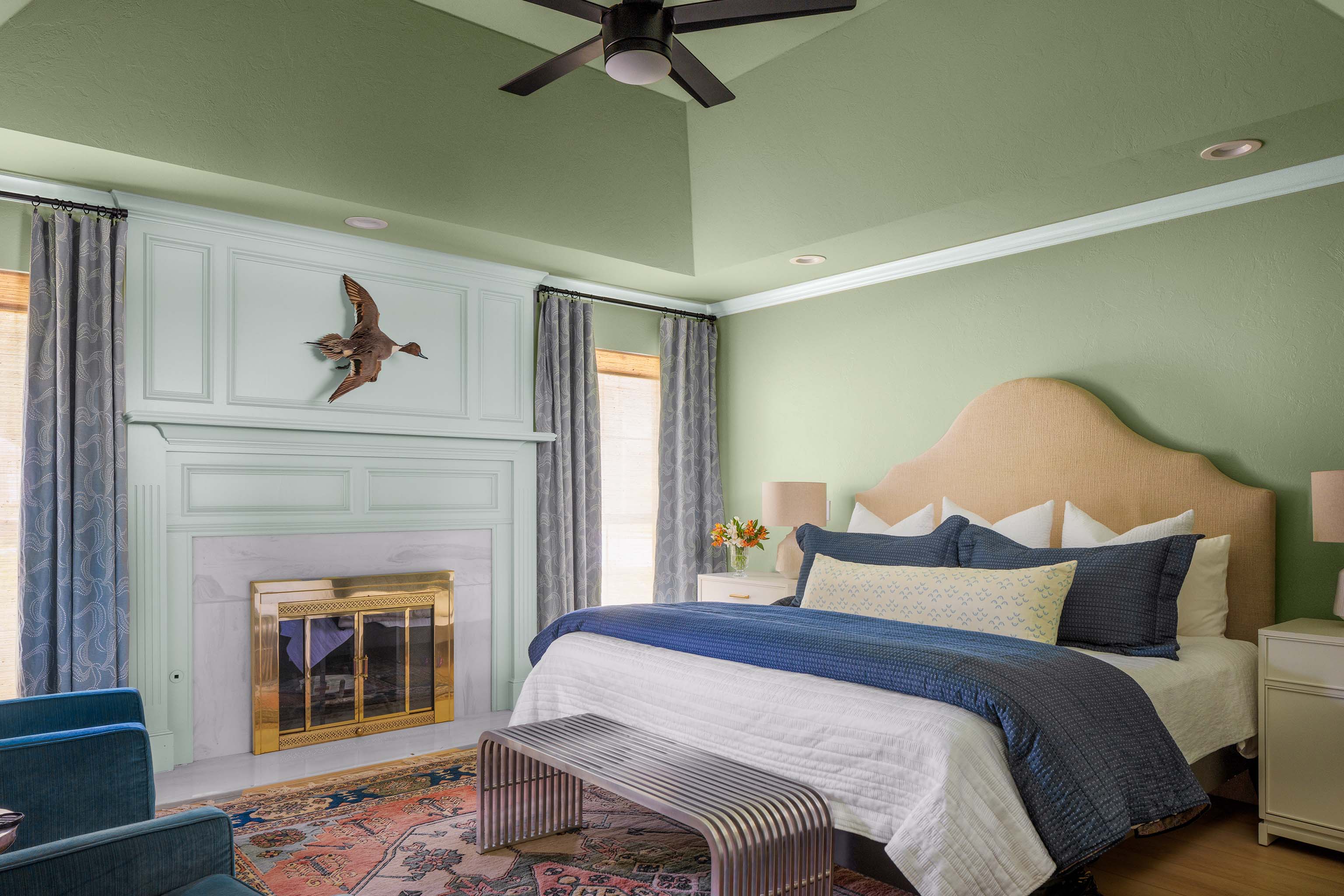 Calm and cool primary bedroom design ideas for a green color scheme. Money Moves, the perfect sage green paint color, and Grayish, a gray with green paint color, make the perfect duo in this bedroom design