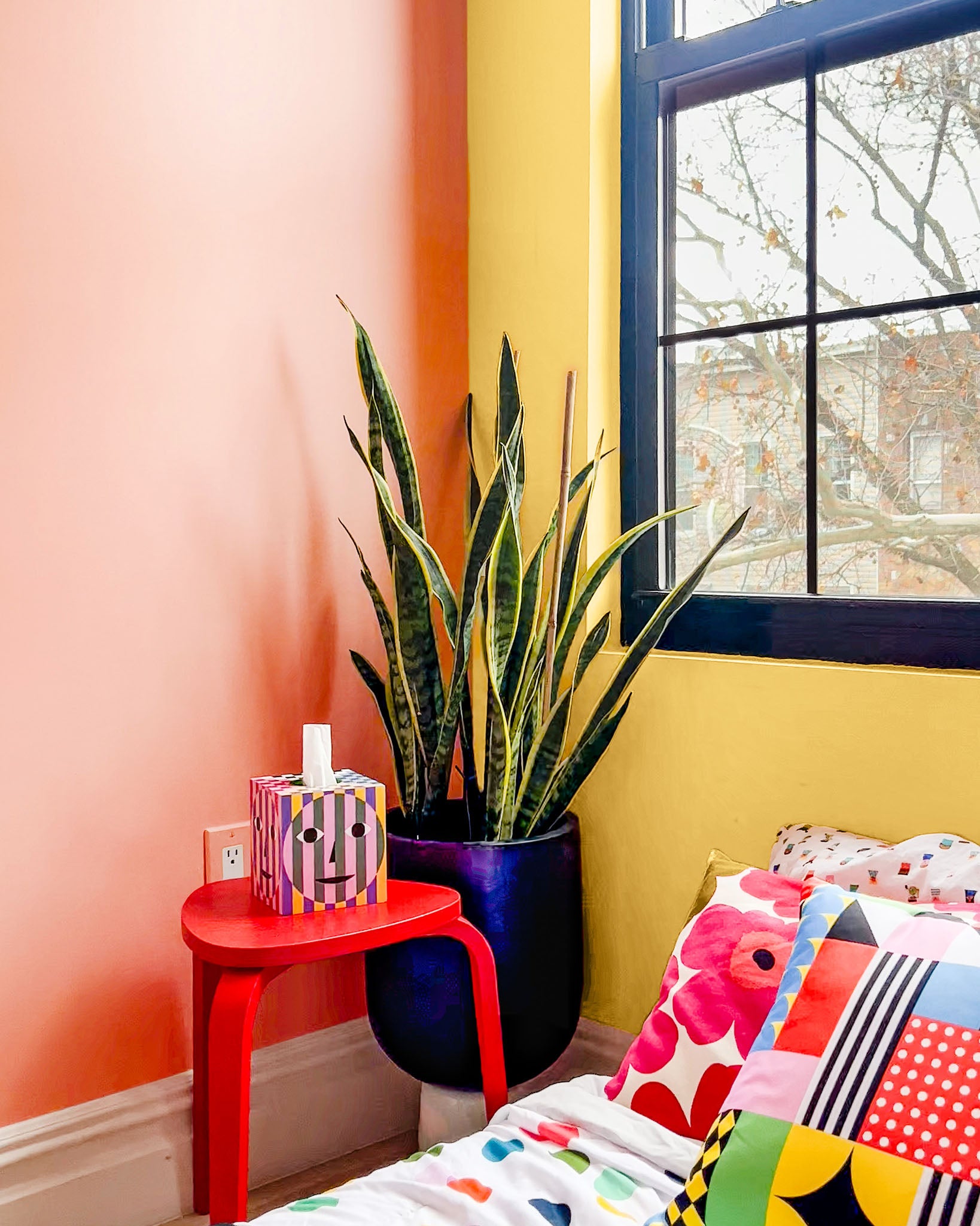 Colorful room idea featuring bright Clare colors Pop, a punchy pink paint color, and Golden Hour, the perfect yellow paint color. See how Clare Collective ambassador Lauren Hom accomplished this on the Clare blog.