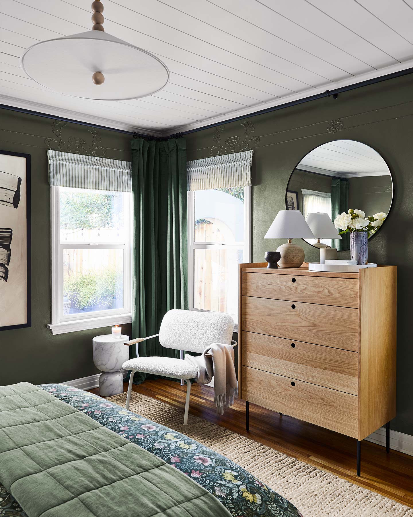 A little color never hurt anyone. Try a dark green bedroom for a relaxing-yet-unexpected vibe.