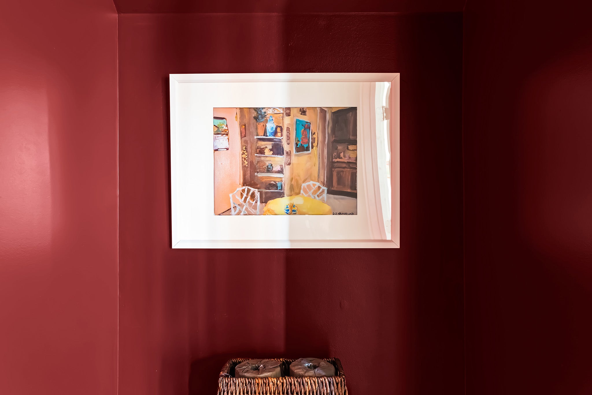 This print of the kitchen from the Golden Girls adds a little extra whimsy to this small space.