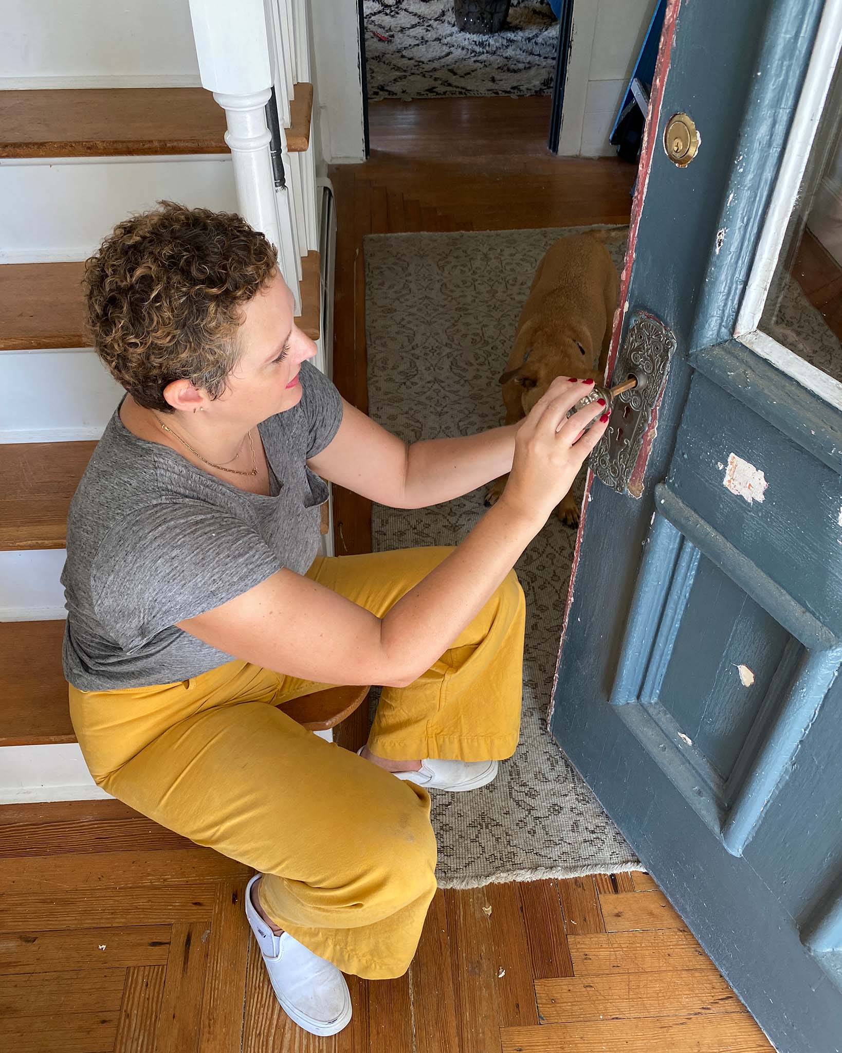 How to paint a front door: Removing door hardware and prepping a front door for painting.