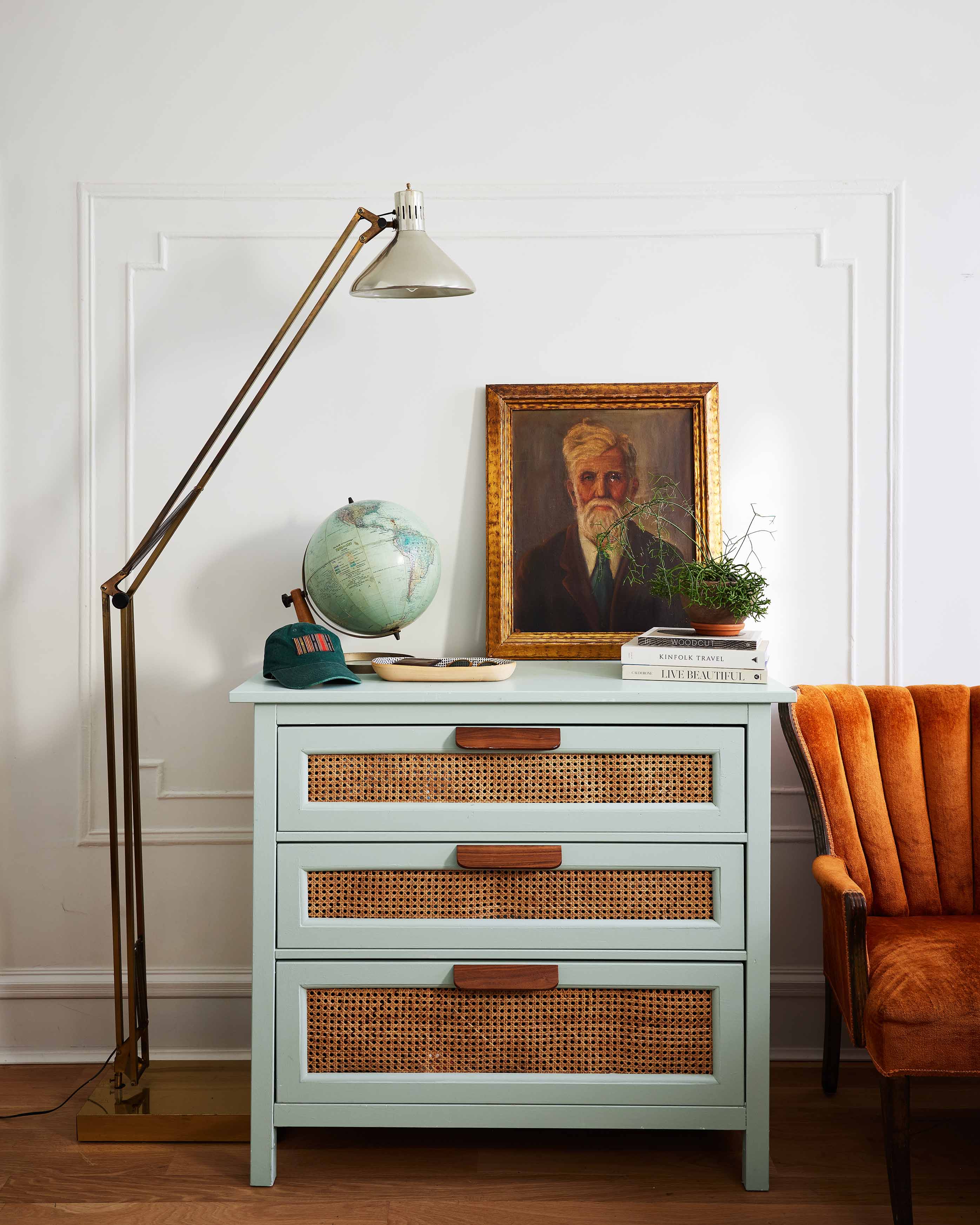 Painting a dresser and adding cane embellishments takes it to a whole other level.