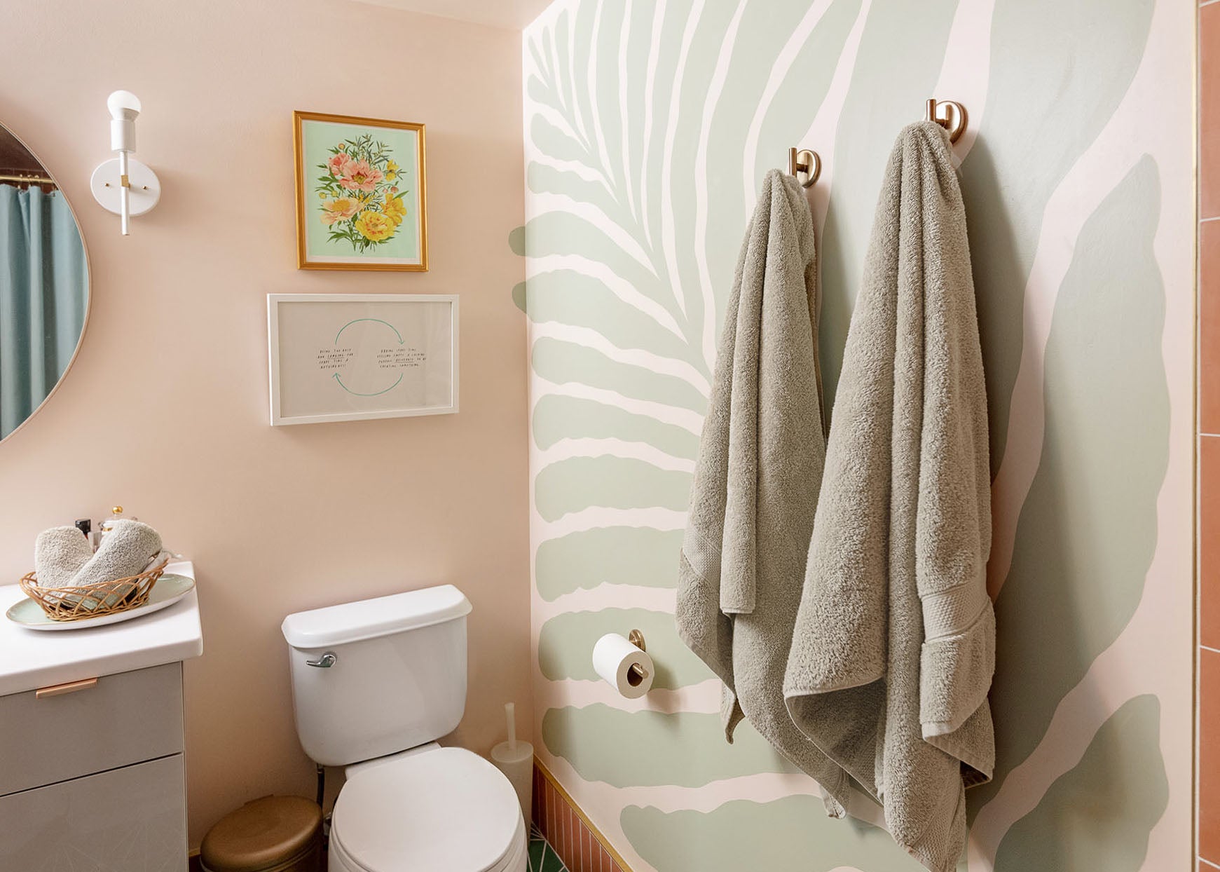 This bathroom went from dull to delightful, just by painting a wall mural.