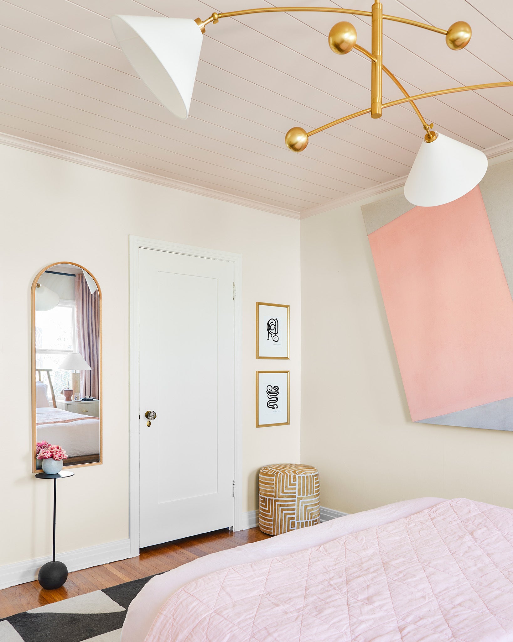 Painting the ceiling an unexpected color, like pale pink, adds interest without overwhelming.