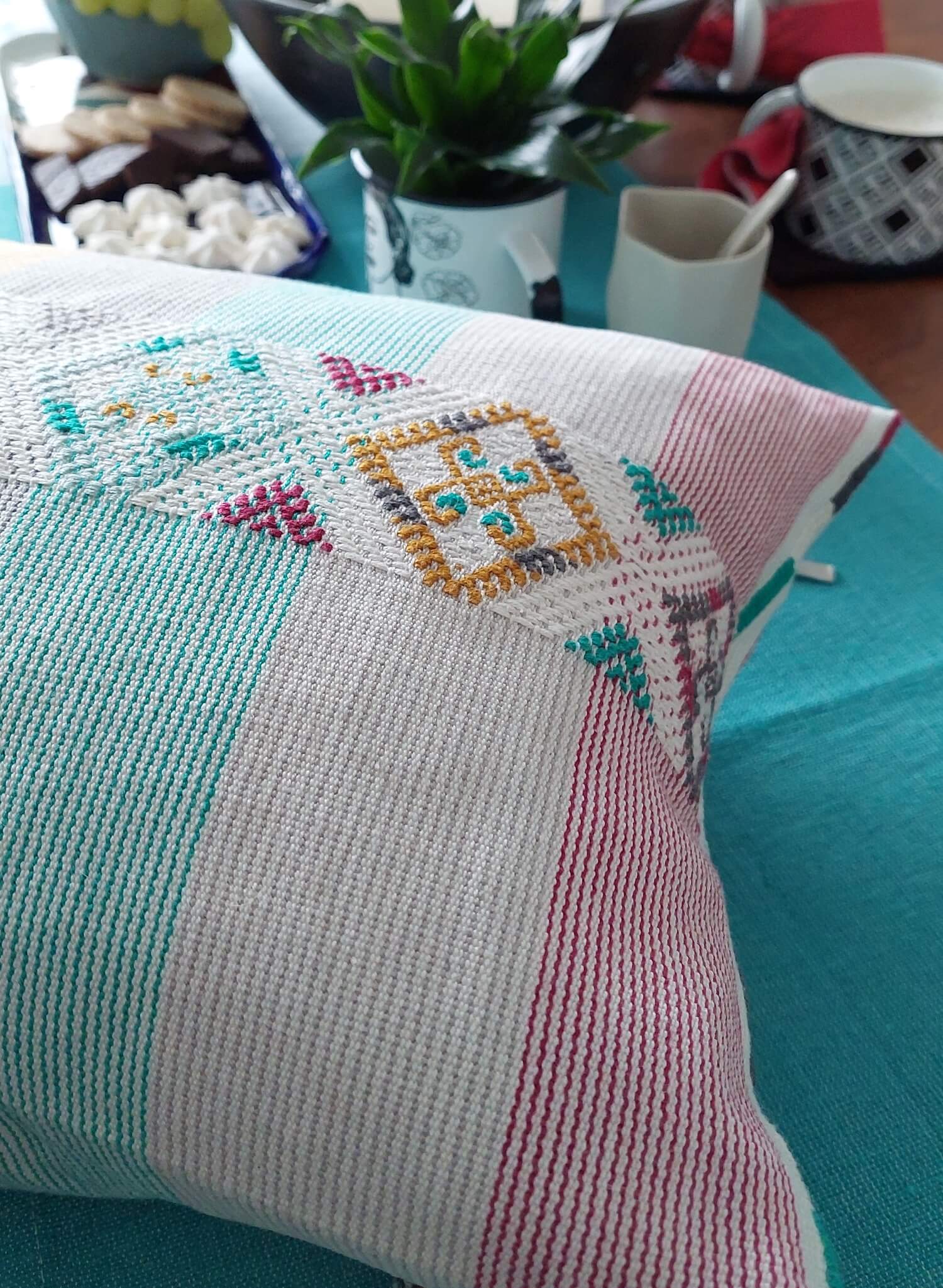 Modern mexican Colorindio pillow aqua and red that matches the coffee table