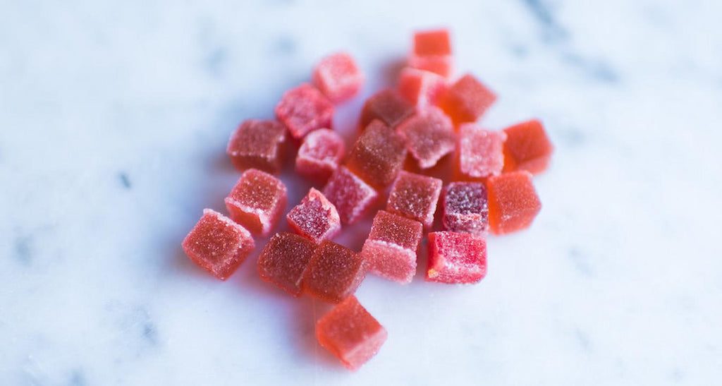 a pile of red cannabis gummies on the counter og kush thc distillate strawberry cough experienced stoner anti inflammatory effects sativa flowers indica flower sativa flower cannabis industry sativa plants other cannabinoids pain relief pain management