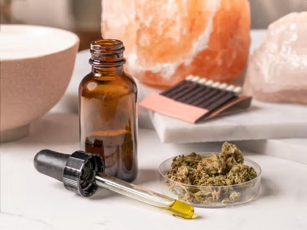 cannabis plant and a dropper of oil on a table cbd legal chronic pain prescription drugs cbd oil consume cbd oil