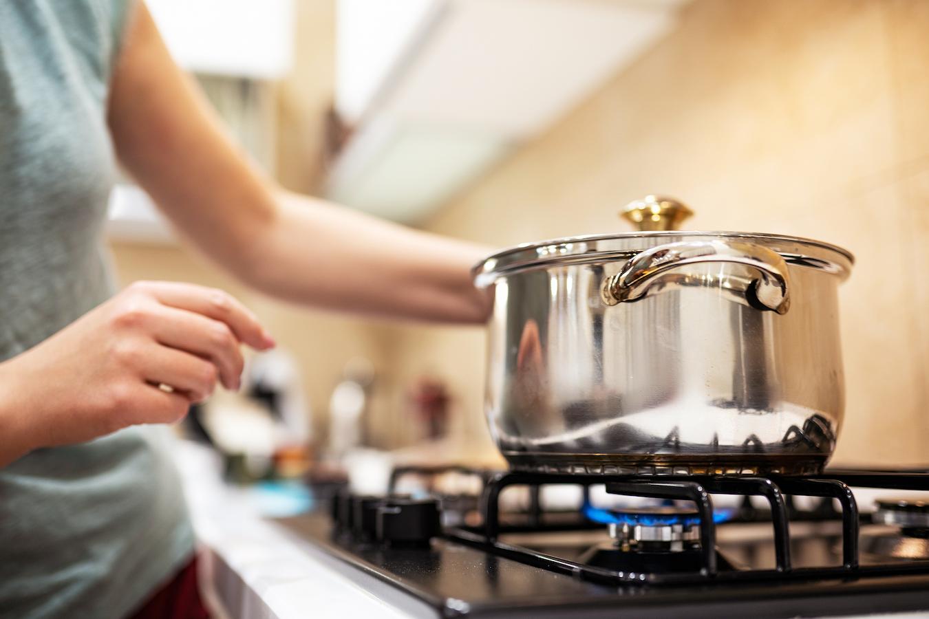 someone cooking a pot on the stove cannabis infused gummies non infused gummies adding cannabis consumers mct oil chewy treats cannabis infusions own edibles making gummies cannabis buds