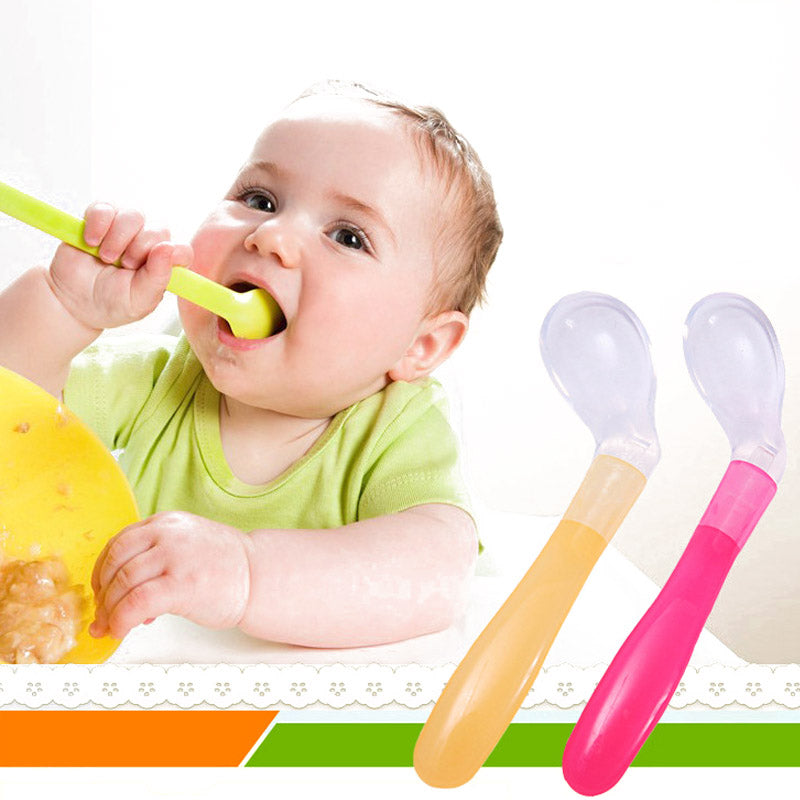 baby eating spoon