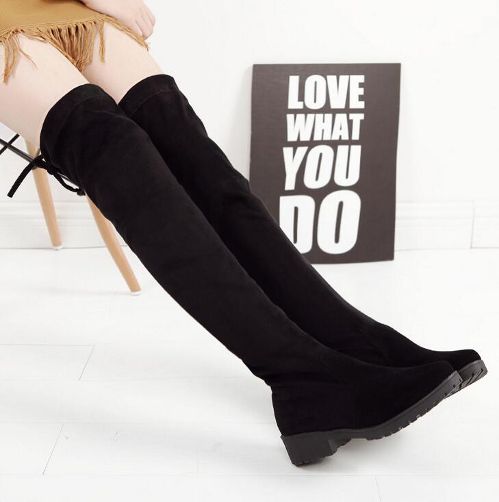 flat long black boots